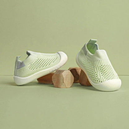 Mint green baby sneakers with soft non-slip sole